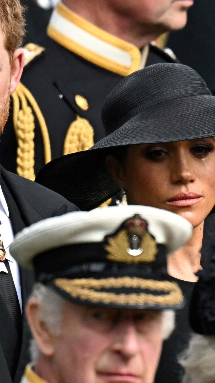 Britain's Meghan, Duchess of Sussex, reacts as she, Prince Harry, Duke of Sussex, Queen Camilla and King Charles III attend the state funeral and burial of Britain's Queen Elizabeth II, in London, Britain. (REUTERS/Toby Melville)