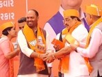 Congress' Rajya Sabha MP and former Union minister Naran Rathwa joined the Bharatiya Janata Party (BJP) along with his son and a large number of supporters in Gujarat on Tuesday.