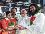 Prime Minister Narendra Modi blesses the newly-wedded daughter and son-in-law of actor-politician Suresh Gopi while visiting Guruvayur Temple in Thrissur district on Wednesday (ANI) Prime Minister Narendra Modi blesses the newly-wedded daughter and son-in-law of actor-politician Suresh Gopi while visiting Guruvayur Temple in Thrissur district on Wednesday (ANI)