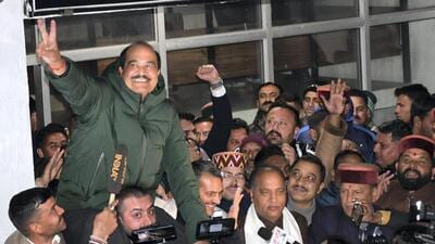 BJP candidate Harsh Mahajan celebrates after being elected as Rajya Sabha member at the Himachal Pradesh Assembly complex, in Shimla, on Tuesday. (PTI) BJP candidate Harsh Mahajan celebrates after being elected as Rajya Sabha member at the Himachal Pradesh Assembly complex, in Shimla, on Tuesday. (PTI)