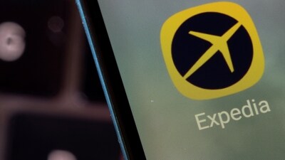 Expedia app is seen on a smartphone in this illustration taken February 27, 2022. REUTERS/Dado Ruvic/Illustration/File Photo