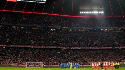 Players observe a minute of silence for former player Andreas Brehme during the German Bundesliga soccer match between FC Bayern Munich and RB Leipzig at the Allianz Arena in Munich, Germany, Feb. 24, 2024. (AP Photo/Matthias Schrader) (AP) Players observe a minute of silence for former player Andreas Brehme during the German Bundesliga soccer match between FC Bayern Munich and RB Leipzig at the Allianz Arena in Munich, Germany, Feb. 24, 2024. (AP Photo/Matthias Schrader) (AP)