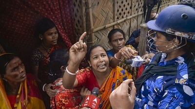 North 24 Parganas: Women stage a protest demanding the arrest of local TMC leaders over Sandeshkhali incident allegations, in North 24 Parganas district, Sunday, Feb. 25, 2024. (PTI Photo) (PTI) North 24 Parganas: Women stage a protest demanding the arrest of local TMC leaders over Sandeshkhali incident allegations, in North 24 Parganas district, Sunday, Feb. 25, 2024. (PTI Photo) (PTI)