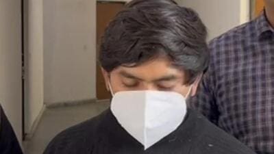 The suspect in custody on Tuesday. (HT Photo) The suspect in custody on Tuesday. (HT Photo)