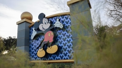 Mickey Mouse welcomes visitors near an entrance to Walt Disney World in Orlando, Florida. (Getty Images via AFP) Mickey Mouse welcomes visitors near an entrance to Walt Disney World in Orlando, Florida. (Getty Images via AFP)