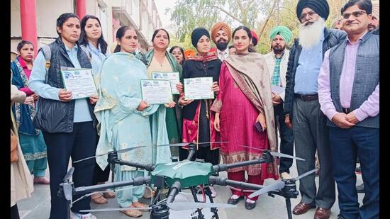 DC Sawhney hands over drones to four women, known as ‘Namo Drone Didis’ . (HT)