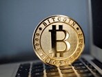 A bitcoin is seen in an illustration picture taken at La Maison du Bitcoin in Paris, France, June 23, 2017.