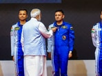 Prime Minister Narendra Modi hands-over wings to astronauts-designate Shubanshu Shukla, Prashanth Balakrishnan Nair, Angad Prathap and Ajit Krishnan who have been selected to be the astronauts on India’s first crewed mission to space 'Gaganyaan Mission', at the Vikram Sarabhai Space Centre (VSSC), in Thiruvananthapuram. (PTI) Prime Minister Narendra Modi hands-over wings to astronauts-designate Shubanshu Shukla, Prashanth Balakrishnan Nair, Angad Prathap and Ajit Krishnan who have been selected to be the astronauts on India’s first crewed mission to space 'Gaganyaan Mission', at the Vikram Sarabhai Space Centre (VSSC), in Thiruvananthapuram. (PTI)