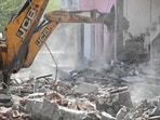 Separately, officials from the forest department, along with Delhi Police carried out a demolition drive at Sangam Vihar in Delhi on Wednesday. (Samchit Khanna/HT Photo) Separately, officials from the forest department, along with Delhi Police carried out a demolition drive at Sangam Vihar in Delhi on Wednesday. (Samchit Khanna/HT Photo)
