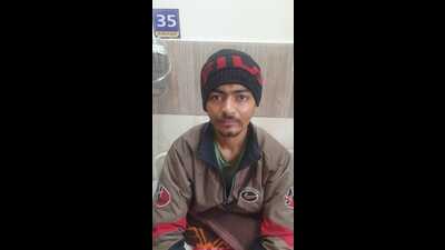 A member of the Davinder Bambiha gang was caught after getting shot in an encounter with the Special Task Force (STF) in Pipli. (HT Photo) A member of the Davinder Bambiha gang was caught after getting shot in an encounter with the Special Task Force (STF) in Pipli. (HT Photo)
