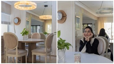 The dining area is Ananya Panday's favourite spot to host family and friends. Big windows, wall mirrors and indoor plants create a sense of airiness in the space and is in line with the actor's affinity for a minimal aesthetic with few standout pieces – the circular light fixture hanging above the dining table, for instance. The dining area is Ananya Panday's favourite spot to host family and friends. Big windows, wall mirrors and indoor plants create a sense of airiness in the space and is in line with the actor's affinity for a minimal aesthetic with few standout pieces – the circular light fixture hanging above the dining table, for instance. 
