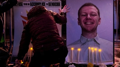 A vigil and protest are held outside a U.S. military recruiting center for U.S. Airman Aaron Bushnell, who died after setting himself on fire in front of the Israeli Embassy in Washington on February 25. (REUTERS)