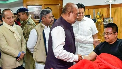 Manipur CM N. Biren Singh accompanied by ministers, MLAs and chief secretary, visited Addl SP M Amit Singh, who was recently attacked by armed miscreants at Raj Medicity Hospital in Imphal on Wednesday. (ANI) Manipur CM N. Biren Singh accompanied by ministers, MLAs and chief secretary, visited Addl SP M Amit Singh, who was recently attacked by armed miscreants at Raj Medicity Hospital in Imphal on Wednesday. (ANI)