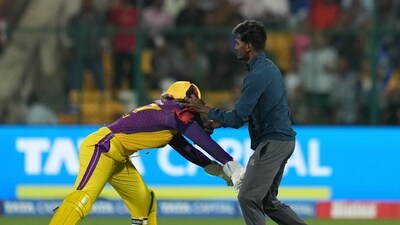 UP Warrioz' captain Alyssa Healy tries to catch a pitch invader (PTI) UP Warrioz' captain Alyssa Healy tries to catch a pitch invader (PTI)