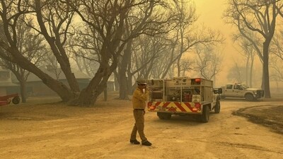 The sprawling blaze was part of a cluster of fires that burned out of control and threatened rural towns. (AP ) The sprawling blaze was part of a cluster of fires that burned out of control and threatened rural towns. (AP )