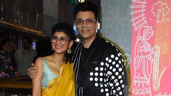 Karan Johar opted for a black jacket and trousers. At the event, he gave Kiran Rao a tight hug and also posed with her for the paparazzi.