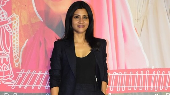 Konkona Sensharma wore a black top under a dark blue jacket and pants for the event.
