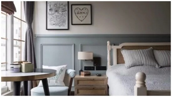 Alia Bhatt and Ranbir Kapoor's bedroom has vintage furniture and a grey and white colour theme. Glass windows and interiors with cosy and on-trend touches, such as black and white abstract artwork, make their bedroom inviting, and serene.&nbsp;