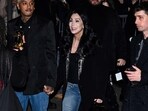 Alexander Edwards and Cher arrive for the presentation of creations by Balmain for the Women Ready-to-wear Fall-Winter 2024/2025 collection as part of the Paris Fashion Week, in Paris on February 28, 2024 (Photo by Miguel MEDINA / AFP)