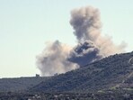 Smoke billows from the site of an Israeli air strike on the outskirts of the southern Lebanese village Smoke billows from the site of an Israeli air strike on the outskirts of the southern Lebanese village