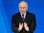 Russian President Vladimir Putin gestures as he delivers his state-of-the-nation address in Moscow, Russia, Thursday, Feb. 29, 2024.