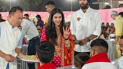 Mukesh Ambani, Anant Ambani and other members of the Ambani family, including Radhika Merchant, served traditional Gujarati food to the villagers. (ANI) Mukesh Ambani, Anant Ambani and other members of the Ambani family, including Radhika Merchant, served traditional Gujarati food to the villagers. (ANI)