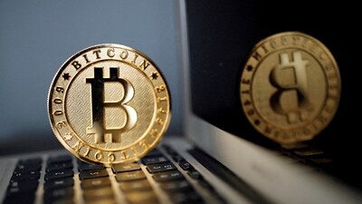 A bitcoin is seen in an illustration picture taken at La Maison du Bitcoin in Paris, France, June 23, 2017. (Reuters)