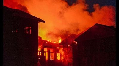 Fire breaks out at a house at the Jamalata area of Nawa Kadal locality, in Srinagar on Thursday. (PTI)