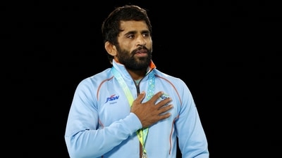 India's Bajrang Punia celebrates on the podium during the medal ceremony (REUTERS)