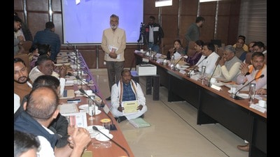 JJP councillor Rajesh Kumar sitting on the floor in protest during the budget meeting of Panchkula municipal corporation. (Sant Arora/HT) JJP councillor Rajesh Kumar sitting on the floor in protest during the budget meeting of Panchkula municipal corporation. (Sant Arora/HT)