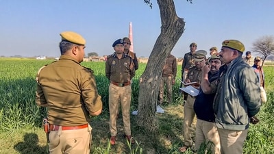 Two minor girls were found hanging from a tree at a brick Kiln in the village Barauli in the Ghatampur area of Kanpur in Uttar Pradesh. (PTI) Two minor girls were found hanging from a tree at a brick Kiln in the village Barauli in the Ghatampur area of Kanpur in Uttar Pradesh. (PTI)