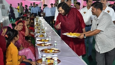 Radhika Merchant's maternal grandmother, along with her parents Viren and Shaila Merchant, also participated in the 'anna seva'. (PTI) Radhika Merchant's maternal grandmother, along with her parents Viren and Shaila Merchant, also participated in the 'anna seva'. (PTI)