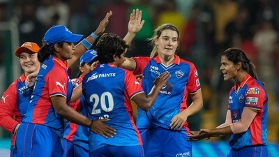The Delhi Capitals beat the Royal Challengers Bangalore by 25 runs to climb to the top of the 2024 Women's Premier League (WPL) table at the M Chinnaswamy Stadium. DC were powered by all-round performances from Marizanne Kapp and Jess Jonassen along with a half-century from Shafali Verma and blazing innings by Alice Capsey. (PTI) The Delhi Capitals beat the Royal Challengers Bangalore by 25 runs to climb to the top of the 2024 Women's Premier League (WPL) table at the M Chinnaswamy Stadium. DC were powered by all-round performances from Marizanne Kapp and Jess Jonassen along with a half-century from Shafali Verma and blazing innings by Alice Capsey. (PTI)