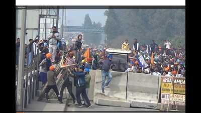 Photo of the protestors vandalising public property, released by Ambala police appealing for identification on February 15. Ambala superintendent of police Jashandeep Singh Randhawa said that they have a huge number of videos gathered by CCTVs, drone cameras and other sources, from which photos have been taken of protesters engaged in violence and who damaged public properties along the border. (Photo: Ambala Police) Photo of the protestors vandalising public property, released by Ambala police appealing for identification on February 15. Ambala superintendent of police Jashandeep Singh Randhawa said that they have a huge number of videos gathered by CCTVs, drone cameras and other sources, from which photos have been taken of protesters engaged in violence and who damaged public properties along the border. (Photo: Ambala Police)