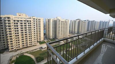 The gated society, constructed at a cost of  ₹700 crore, comprises of 11 towers with 1,130 flats, and each flat is guaranteed two parking spaces in the basement. (HT Archive)