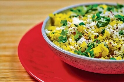 Poha topped with grated coconut is a must-have (Shutterstock) Poha topped with grated coconut is a must-have (Shutterstock)
