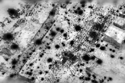 This image grab from a handout video released by the Israeli army on February 29, 2024, shows what the army says are Gazans around aid trucks in Gaza City. Israeli forces shot dead 104 people when a crowd rushed towards aid trucks on February 29. (AFP) This image grab from a handout video released by the Israeli army on February 29, 2024, shows what the army says are Gazans around aid trucks in Gaza City. Israeli forces shot dead 104 people when a crowd rushed towards aid trucks on February 29. (AFP)