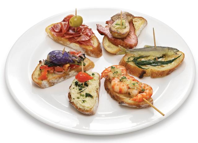 Each city has its own associations. In Venice, it is cicchetti, the open sandwich with interesting toppings. (Adobe Stock) Each city has its own associations. In Venice, it is cicchetti, the open sandwich with interesting toppings. (Adobe Stock)