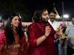 Anant Ambani, son of Mukesh Ambani, Chairman of Reliance Industries, and Radhika Merchant, daughter of industrialist Viren Merchant, serve traditional Gujarati food to villagers ahead of their pre-wedding celebrations on the outskirts of Jamnagar, Gujarat.