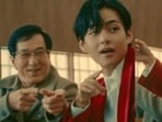 Jackie Chan and V in an ad for SimInvest