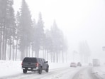 Vehicles drive as snow falls along Interstate 80 (I-80) in the Sierra Nevada mountains at the start of a powerful winter storm on February 29, 2024 near Kingvale, California. Blizzard warnings have been issued with snowfall of up to 12 feet and wind gusts of up to 100 mph expected in some higher elevation locations during the multiple day storm. Vehicles drive as snow falls along Interstate 80 (I-80) in the Sierra Nevada mountains at the start of a powerful winter storm on February 29, 2024 near Kingvale, California. Blizzard warnings have been issued with snowfall of up to 12 feet and wind gusts of up to 100 mph expected in some higher elevation locations during the multiple day storm.