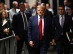 Former U.S. President Donald Trump walks outside the courtroom on the day of a court hearing on charges of falsifying business records to cover up a hush money payment to a porn star before the 2016 election, in New York State Supreme Court in the Manhattan borough of New York City, U.S., REUTERS/Andrew Kelly/File Photo