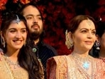 Anant Ambani and Radhika Merchant sported their brightest smiles as they posed with Nita Ambani for the cameras. Anant Ambani and Radhika Merchant sported their brightest smiles as they posed with Nita Ambani for the cameras.