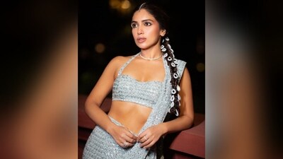 Assisted by celebrity fashion stylist Manisha Melwani, Bhumi accessorised her look with a sleek diamond choker necklace, matching mangtika, multiple diamond rings adorning her finger and a pair of silver high heels which perfectly complemented her glam look. (Instagram/@bhumipednekar) Assisted by celebrity fashion stylist Manisha Melwani, Bhumi accessorised her look with a sleek diamond choker necklace, matching mangtika, multiple diamond rings adorning her finger and a pair of silver high heels which perfectly complemented her glam look. (Instagram/@bhumipednekar)