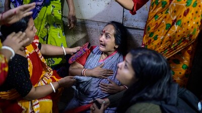 Relatives gathered at the hospital early on Friday to receive the bodies of the dead, with some mourning outside the emergency department. (AP) Relatives gathered at the hospital early on Friday to receive the bodies of the dead, with some mourning outside the emergency department. (AP)