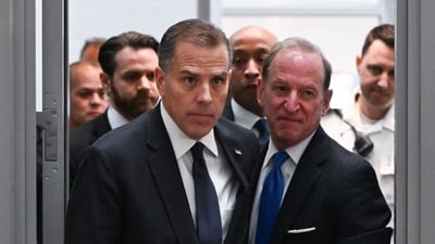 TOPSHOT - (L-R) Hunter Biden, son of US President Joe Biden, and attorney Abbe Lowell arrive for a closed-door deposition with the House Oversight and Judiciary committees on Capitol Hill in Washington, DC, February 28, 2024. (Photo by ROBERTO SCHMIDT / AFP) (AFP)