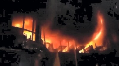 The fire on Thursday night that engulfed the Green Cozy Cottage building in the capital’s Baily Road area housed several restaurants and shops. (PTI) The fire on Thursday night that engulfed the Green Cozy Cottage building in the capital’s Baily Road area housed several restaurants and shops. (PTI)