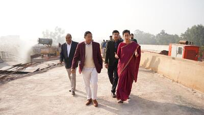 PWD minister Atishi inspects an under-construction flyover in Anand Vihar in December. (HT Photo)