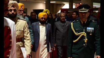 Punjab governor Banwarilal Purohit and chief minister Bhagwant Mann arriving at the Vidhan Sabha in Chandigarh on the opening day of the budget session on Friday. (Ravi Kumar/HT) Punjab governor Banwarilal Purohit and chief minister Bhagwant Mann arriving at the Vidhan Sabha in Chandigarh on the opening day of the budget session on Friday. (Ravi Kumar/HT)