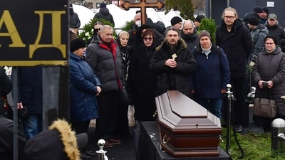 Lyudmila Navalnaya (C) and Anatoly Navalny (2nd L), parents of late Russian opposition leader Alexei Navalny, mourn next to a coffin during a funeral ceremony for his son at the Borisovo cemetery in Moscow's district of Maryino on March 1, 2024. (AFP) Lyudmila Navalnaya (C) and Anatoly Navalny (2nd L), parents of late Russian opposition leader Alexei Navalny, mourn next to a coffin during a funeral ceremony for his son at the Borisovo cemetery in Moscow's district of Maryino on March 1, 2024. (AFP)